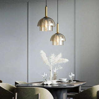 Handcrafted metal and glass pendant lamp — warm cognac glow luxury lighting