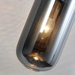 Nordic metal wall sconce close-up — black frame with smoke glass shade