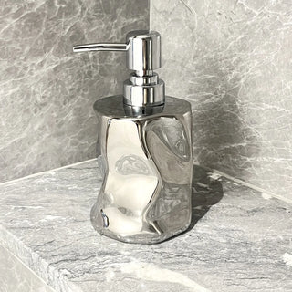 handcrafted ceramic lotion dispenser bathroom side view