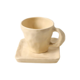 ceramic yellow mug handcrafted nordic style organic coffee cup comfortable grip front view
