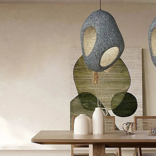Nordic pendant lamp glowing — Scandinavian artisan ceiling light