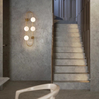 Modern Scandinavian capsule wall lamp — brass metal interior sconce
