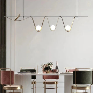 Glass and metal pendant close-up — artisan luxury pendant lamp