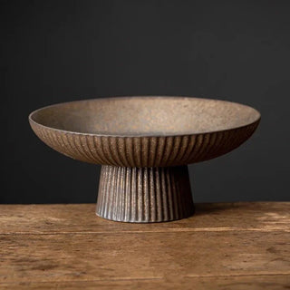 ceramic display bowl earthworks handcrafted porcelain serving dish rustic brown vintage close-up