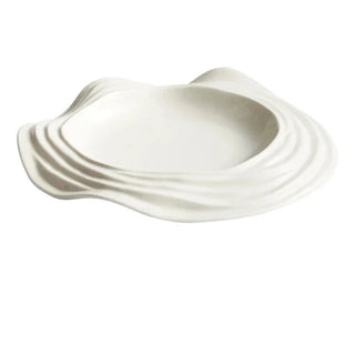 white ceramic plate earthworks handcrafted porcelain plates unique wave design angle view