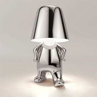 Golden resin lamp detail — designer warm LED fixture