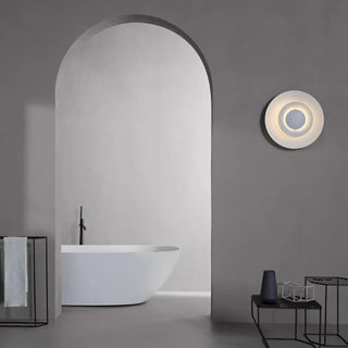 Modern iron LED wall sconce illuminated — Della Lucie fixture