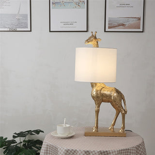 Giraffe table lamp detail — gold finish designer LED