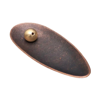 bronze incense holder handcrafted metal tray burning incense close-up