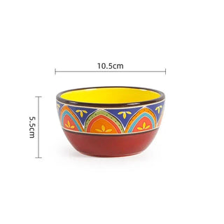 hand-painted ceramic dinnerware earthworks artisan crafted porcelain plates bowls set top view