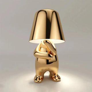 Designer gold resin lamp side — warm ambient LED