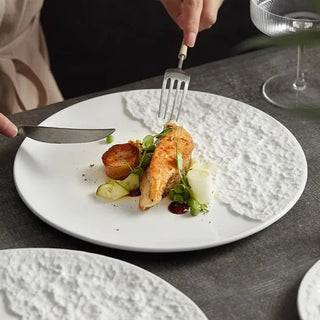 textured ceramic plate earthworks luxury porcelain plate set sandy texture design close-up
