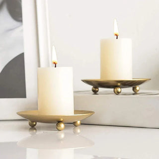 iron plate candle holder large metal candle stand gold black decor close-up