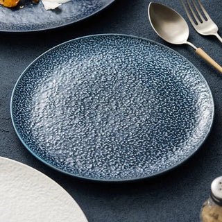 ceramic dinner plates earthworks handcrafted textured porcelain dinnerware close-up