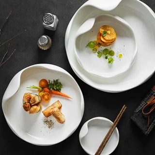 ceramic plate earthworks handcrafted porcelain dinnerware set luxury dining plate detail