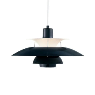Contemporary metal pendant light close-up — sleek dimmable fixture