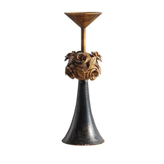 floral metal candlestick black iron candle holder copper accents close-up