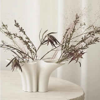 ceramic vase handmade porcelain flower holder elegant white decor close-up