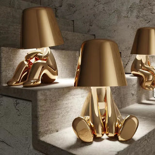 Warm LED golden resin lamp — designer ambient