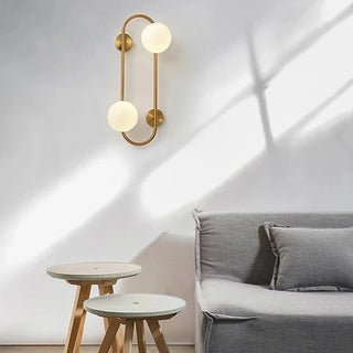 Capsule brass wall sconce detail — Scandinavian modern LED light