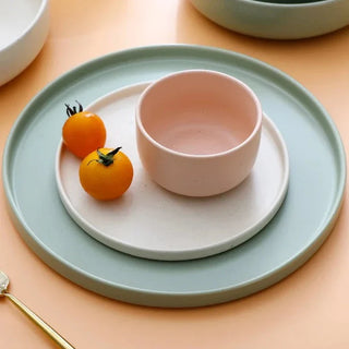 japanese ceramic dinnerware earthworks minimalist porcelain tableware pink plates bowls side view