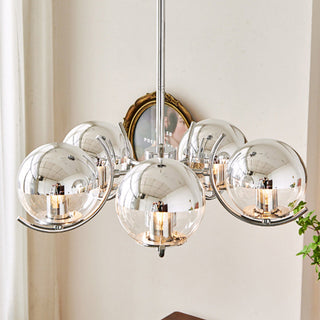 Silver glass chandelier close-up — modern metal frame space detail