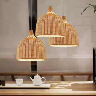 Handwoven bamboo basket pendant over kitchen dining area