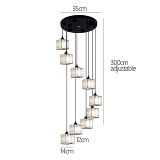 Sleek pendant over staircase — modern iron fixture