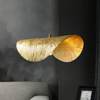 Close-up of hammered copper leaf pendant — handcrafted designer fixture