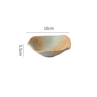 japanese ceramic dinnerware earthworks handcrafted porcelain bowls elegant plates set display view