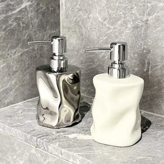 handcrafted ceramic lotion dispenser bathroom set view