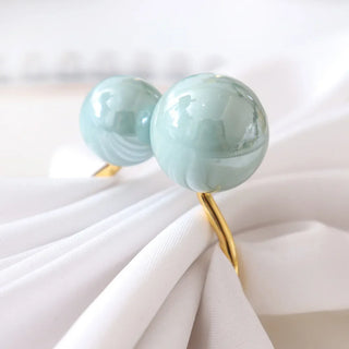 napkin holder rings palma pearl gold blue aluminium alloy table decor front view