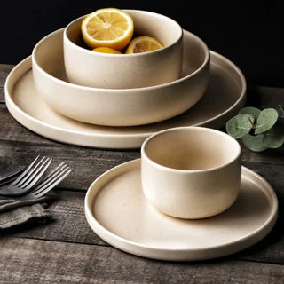 matte ceramic dinnerware earthworks frosted porcelain plates handcrafted bowls set close-up