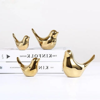golden bird figure handmade enamel ceramic bird sculpture elegant home decor side view