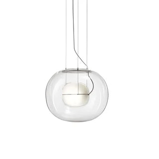 White pearl glass globe pendant hanging in a bright contemporary interior