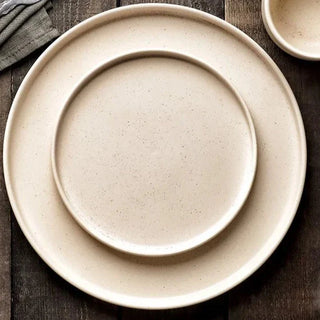 matte ceramic dinnerware earthworks frosted porcelain plates handcrafted bowls set top view