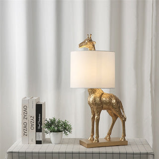 Designer LED giraffe table lamp — gold finish ambient