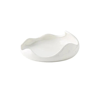 ceramic plate earthworks handcrafted porcelain dinnerware set luxury dining plate lifestyle view