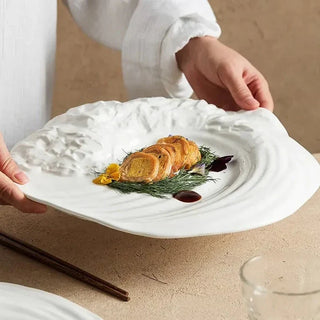 ceramic plate earthworks handcrafted porcelain rocky texture luxury dinnerware side view