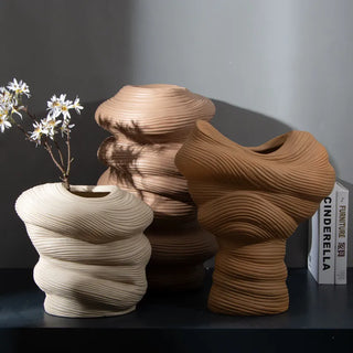 ceramic winding vase handmade porcelain decorative pot earthworks close-up