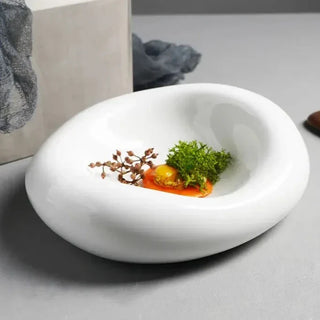 ceramic plate bowl earthworks handcrafted porcelain dinnerware smooth chunky dish close-up