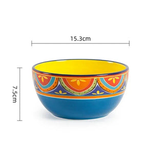 hand-painted ceramic dinnerware earthworks artisan crafted porcelain plates bowls set display view