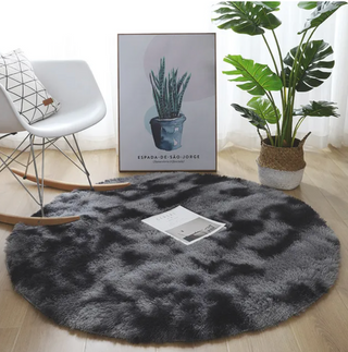 round dark grey kilim style polyester floor area rug side view