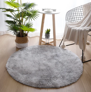 round light grey kilim style polyester area rug floor mat close-up