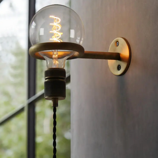 Metal industrial wall sconce with E27 bulb — vintage-style wall lamp