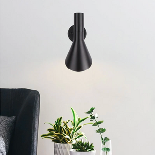 ZITA wall sconce ambient view — matte black Italian designer light