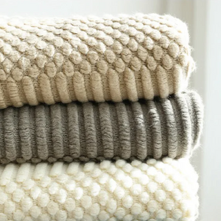 hand-knitted blanket cozy throw soft polyester malibu texture detail