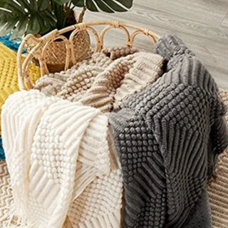 hand-knitted blanket cozy throw soft polyester malibu texture set view