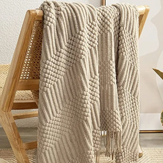 hand-knitted blanket cozy textured knit throw yellow tela nativa detail