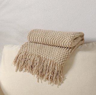 hand-knitted blanket cozy knit cream brown textured throw side view
